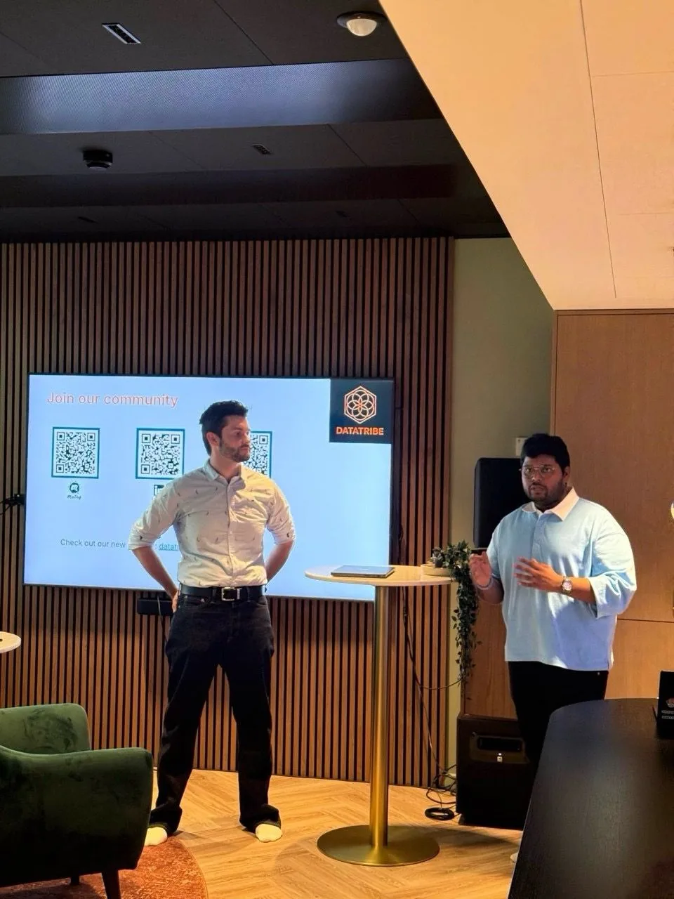 Sanket (right) on stage at DataTribe Collective, Helsinki